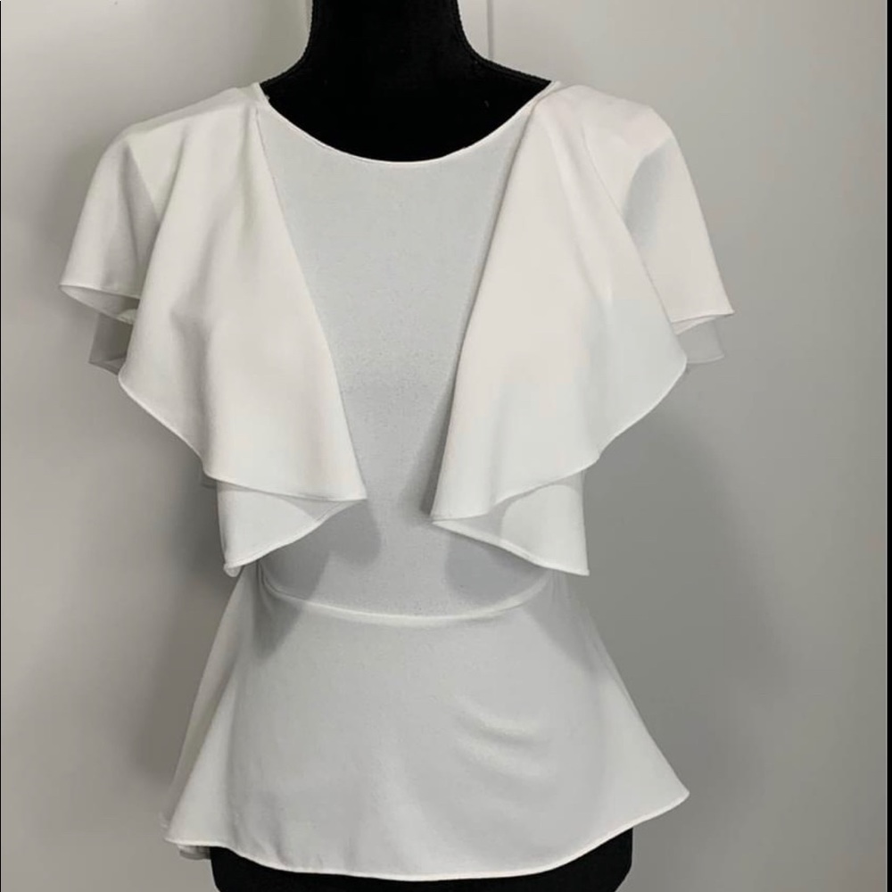 White peplum top